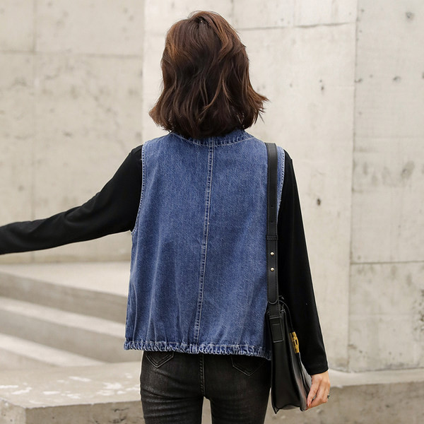 Γυναικείο γιλέκο τζιν με τσέπες και φερμουάρ