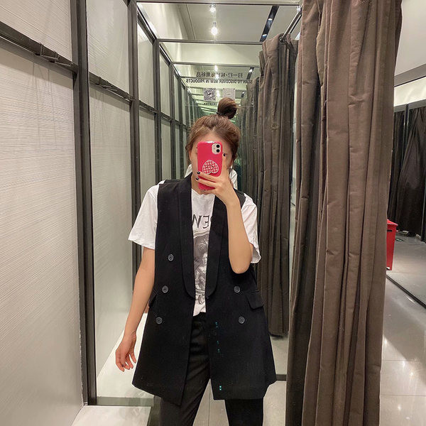 Κομψό  γιλέκο με κουμπιά δύο σειρών