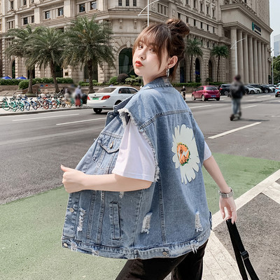 Γυναικείο casual γιλέκο με απλικέ στην πλάτη και σχισμένα μοτίβα