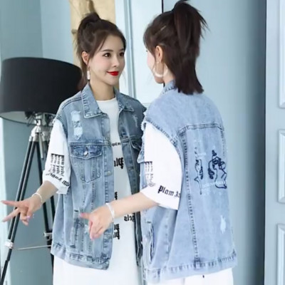 Ženski prsluk s džepovima i vezom