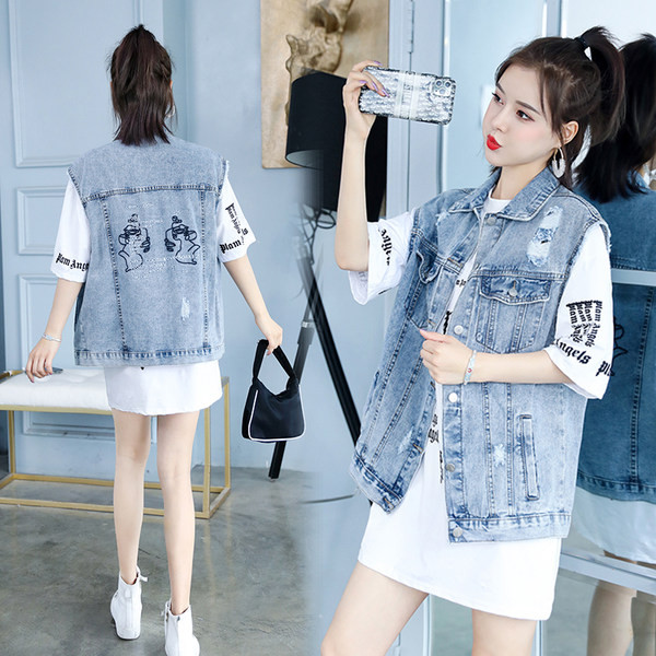 Ženski prsluk s džepovima i vezom