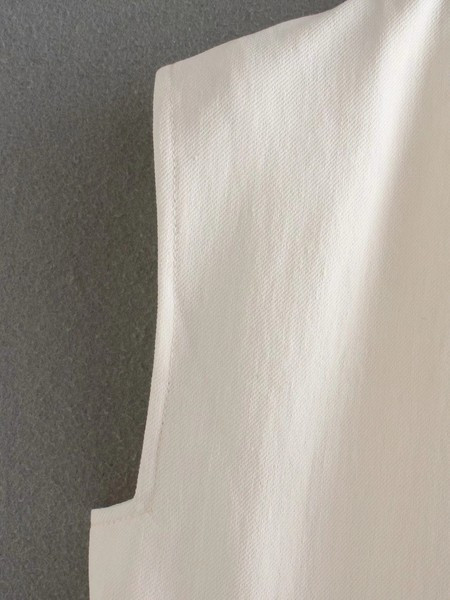 Γυναικείο μακρύ γιλέκο με ασύμμετρη στερέωση