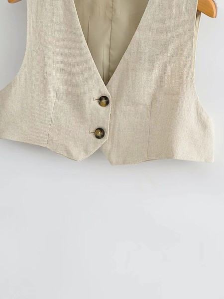Κοντή τοποθέτηση γιλέκο με κουμπιά 