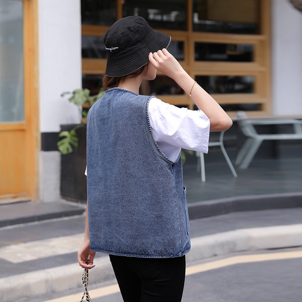 Γυναικείο γιλέκο με τσέπες και κουμπιά σε μπλε χρώμα