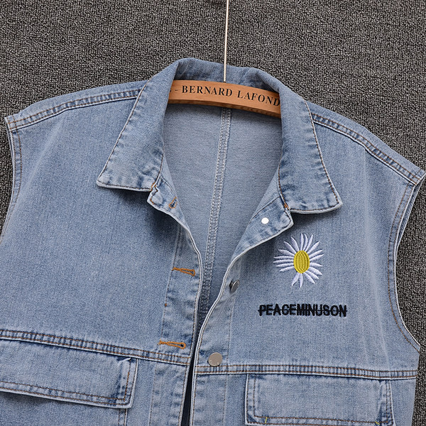 Ženski traper prsluk s vezom tratinčica