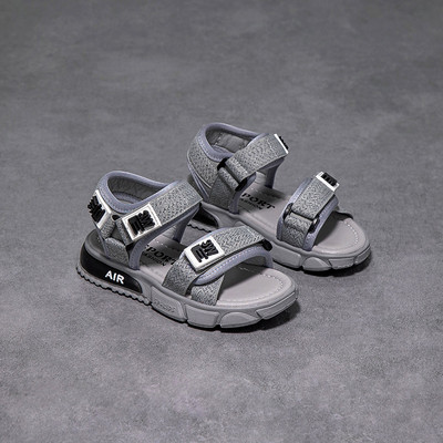 Dječje ležerne sandale u crno-bijeloj boji