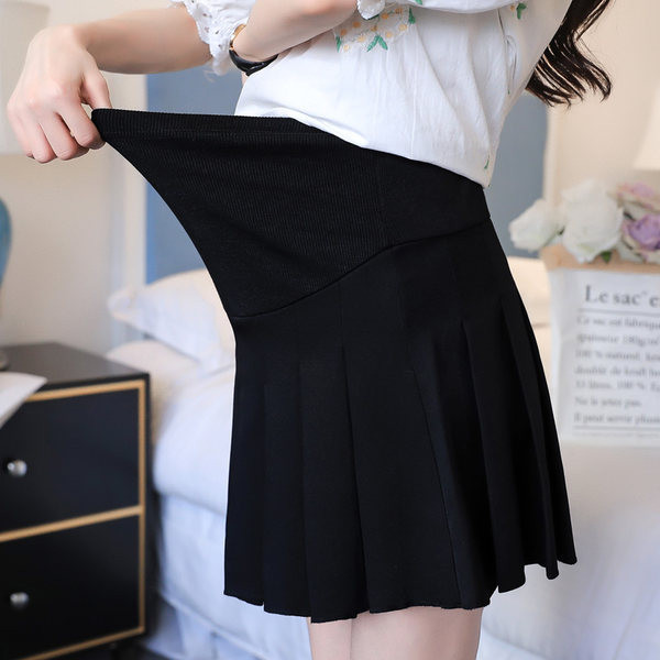 Modernus moteriškas trumpas sijonas nėščiosioms