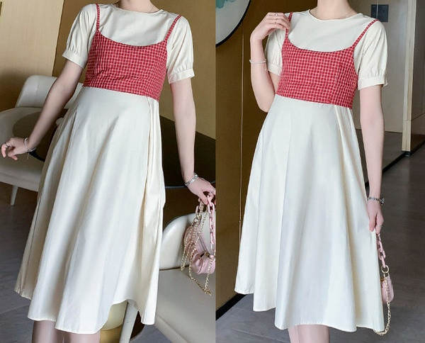 Izrezani model ženske haljine s ovalnim izrezom za trudnice