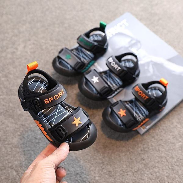 Dječje sandale u crnoj boji sa zakrpom i ravnim đonom