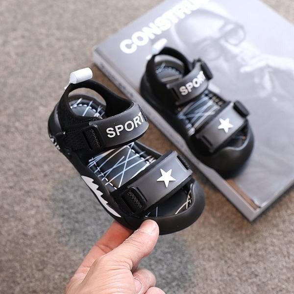 Dječje sandale u crnoj boji sa zakrpom i ravnim đonom