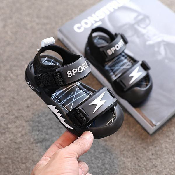 Dječje sandale sa zakrpama i ravnim potplatom u crnoj boji