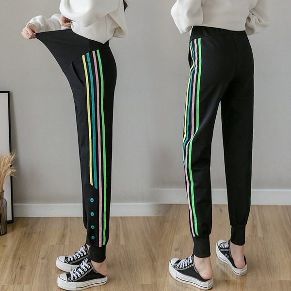 Ženske sportske duge hlače s gumbima i rubom za trudnice