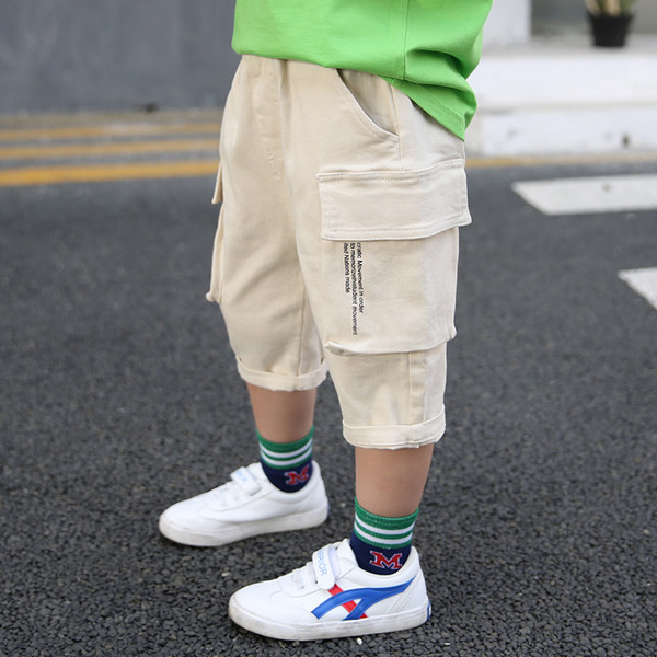 Παιδικό παντελόνι με πλαϊνές τσέπες και μήκος 3/4