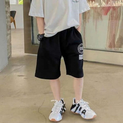 Παιδικά σορτς με ελαστική μέση και τσέπες σε μαύρο και γκρι χρώμα