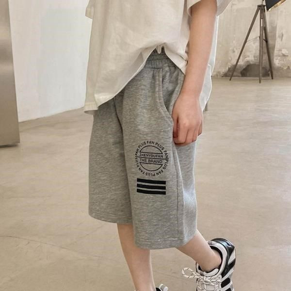 Παιδικά σορτς με ελαστική μέση και τσέπες σε μαύρο και γκρι χρώμα