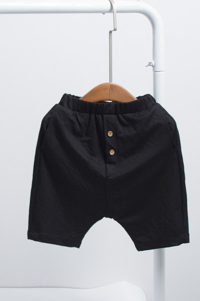 Crne dječje kratke hlače s gumbima