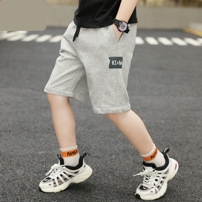 Dječje kratke hlače s vezicama i džepovima dužine 3/4