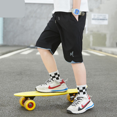 Dječje kratke hlače s vezicama i džepovima dužine 3/4