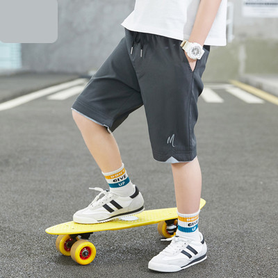 Dječje kratke hlače s vezicama i džepovima dužine 3/4