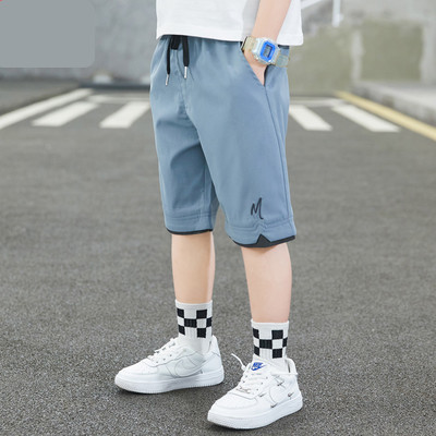 Dječje kratke hlače s vezicama i džepovima dužine 3/4