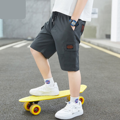 Dječje kratke hlače s vezicama i džepovima dužine 3/4