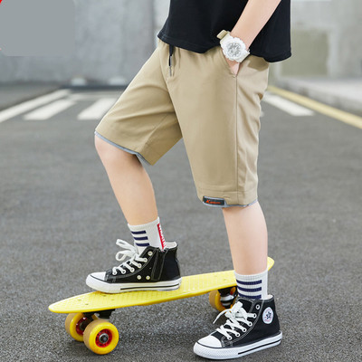 Dječje kratke hlače s vezicama i džepovima dužine 3/4