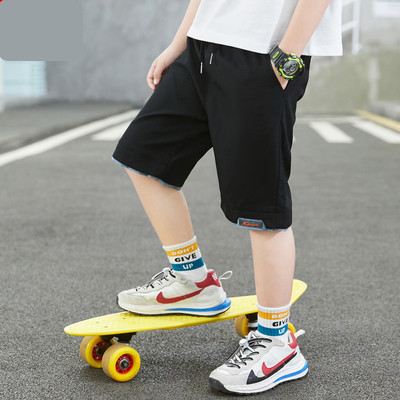 Dječje kratke hlače s vezicama i džepovima dužine 3/4