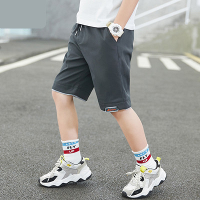 Dječje kratke hlače s vezicama i džepovima dužine 3/4