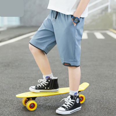 Dječje kratke hlače s vezicama i džepovima dužine 3/4