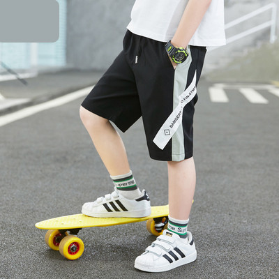 Dječje kratke hlače s vezicama i džepovima dužine 3/4