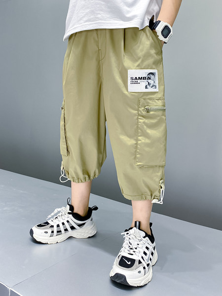 Dječje hlače s džepovima i printom u dvije boje