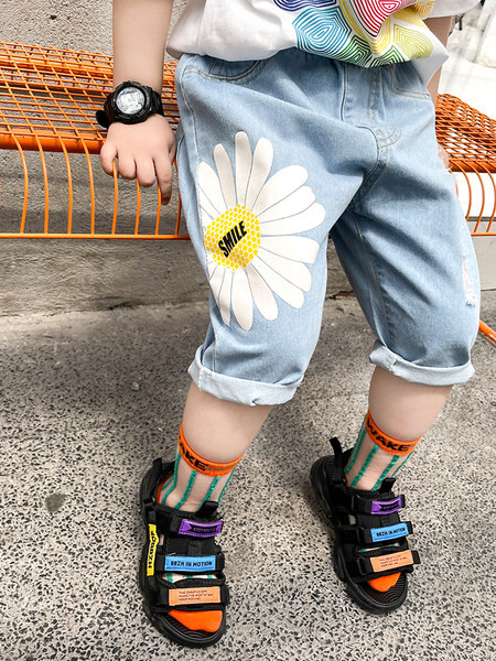 Παιδικά τζιν με απλικέ και τσέπες - μήκος 3/4