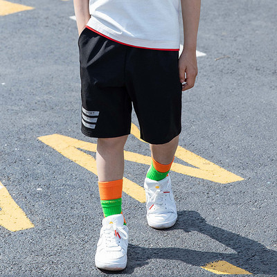 Dječje kratke hlače s džepovima i natpisom -3/4 dužine