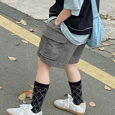 Taskutega ja 3/4 pikkusega lastepüksid