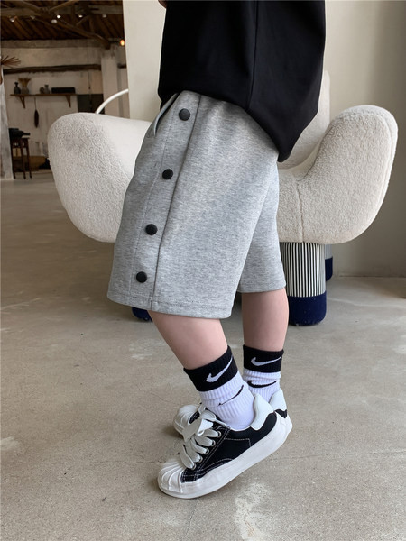 Dječje hlače u crnoj i sivoj boji s elastičnim strukom