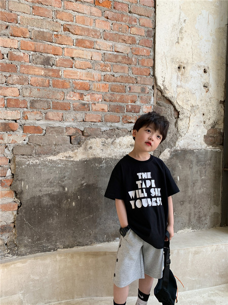 Dječje hlače u crnoj i sivoj boji s elastičnim strukom