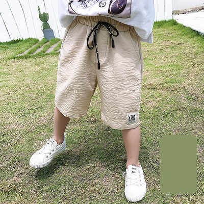 Παιδικό παντελόνι με κορδόνια και επιγραφή 