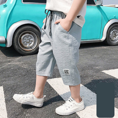 Παιδικό παντελόνι με κορδόνια και επιγραφή 