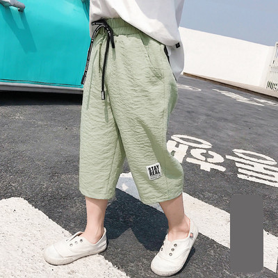 Παιδικό παντελόνι με κορδόνια και επιγραφή 