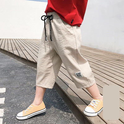 Παιδικό παντελόνι με κορδόνια και επιγραφή 