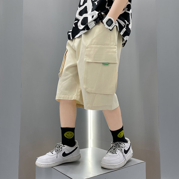 Детски къси панталони с джобове в син и бежов цвят 