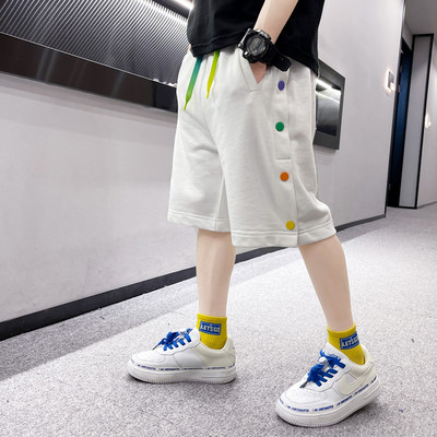 Нов модел детски панталони в бял и черен цвят с цветни пулове и връзки