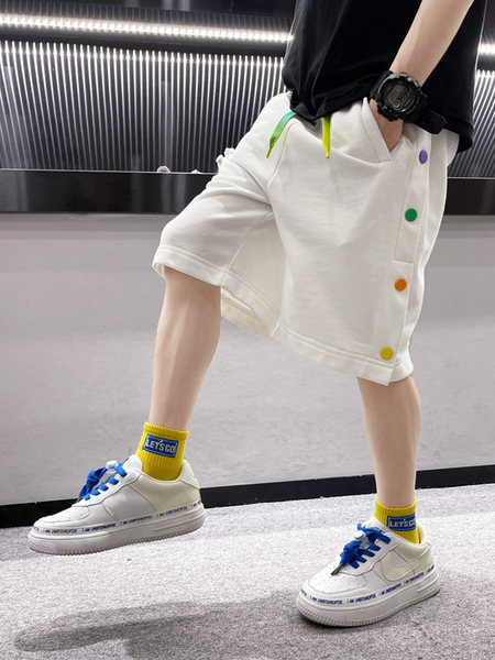 Нов модел детски панталони в бял и черен цвят с цветни пулове и връзки