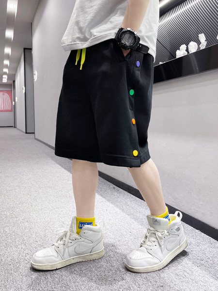 Нов модел детски панталони в бял и черен цвят с цветни пулове и връзки