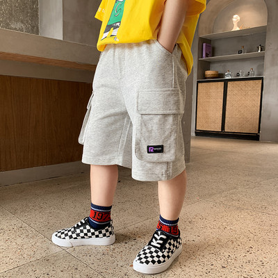 Ежедневни панталони с джобове и емблема за момчета