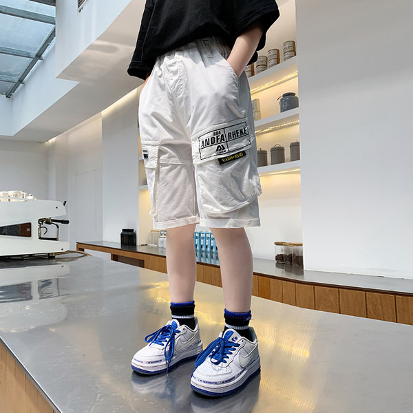 Детски къси панталони с надписи в черен и бял цвят 