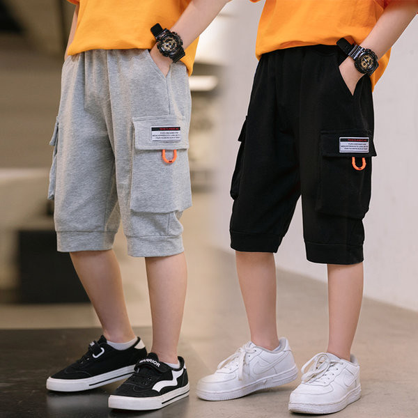 Детски панталони с 3/4 дължина и джобове в два цвята