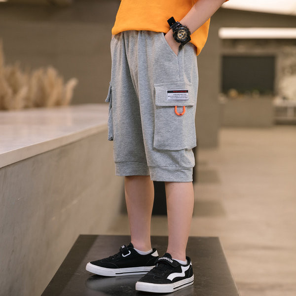 Детски панталони с 3/4 дължина и джобове в два цвята