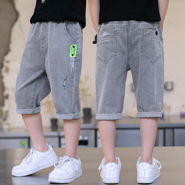 Детски панталони с дължина 3/4 и джобове 