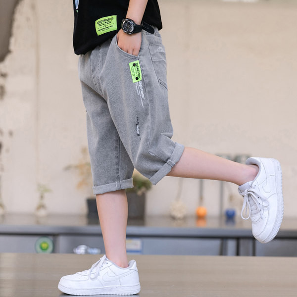 Детски панталони с дължина 3/4 и джобове 